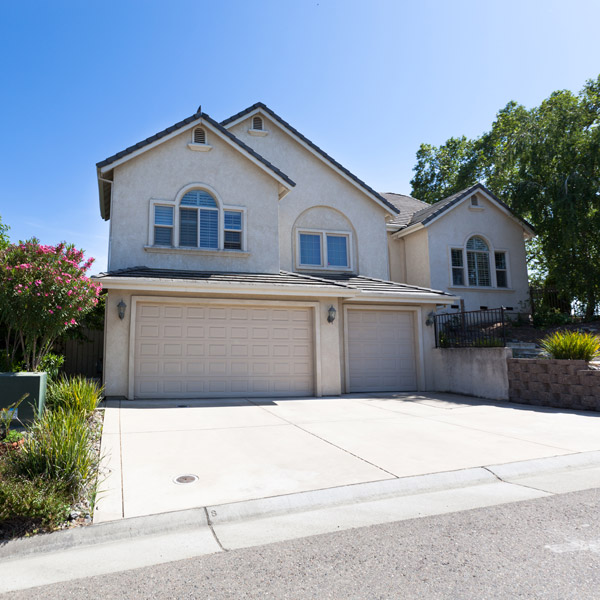 house exterior with nice concrete driveway