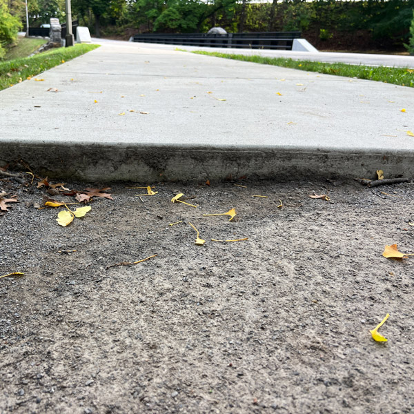 uneven concrete sidewalk